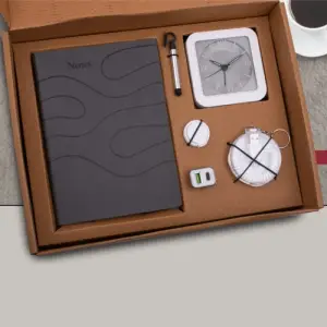 6 in 1 Gray set: Mobile Finger ring, All in 1 Cable with Keychain, Fast Dual USB Car charger, Jack stylus with phone stand, Glow Clock and A5 PU notebook in Kraft Gift Box